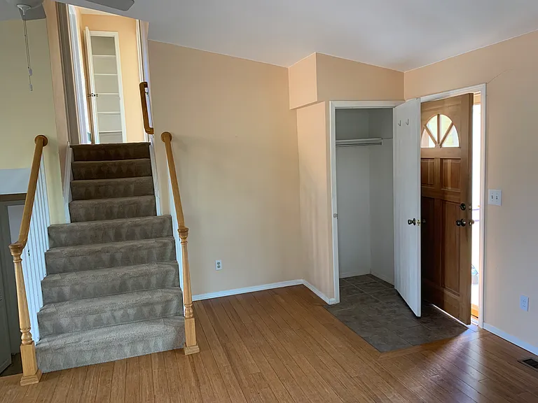 Coat closet by front door; hall closet upstairs at end of hallway