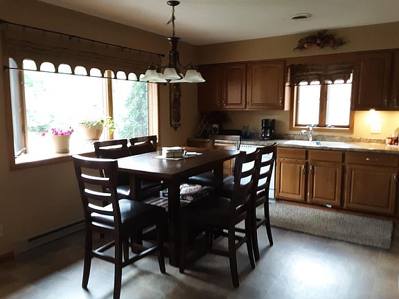 Large kitchen with optional furnished table & 6 chairs.