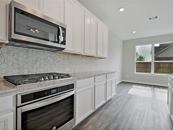 4th image of 12039 Tree Top Hills Ln