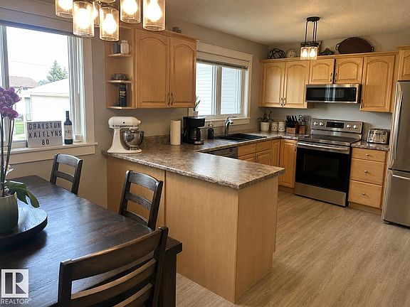 5th image of 4229 48a St