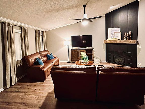 Living room with vaulted  