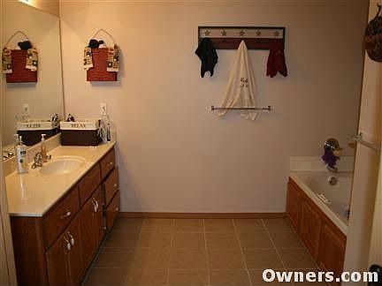 Master bath with jet tub and walk in shower