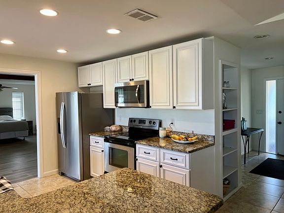 Kitchen featuring Granite Counter Tops