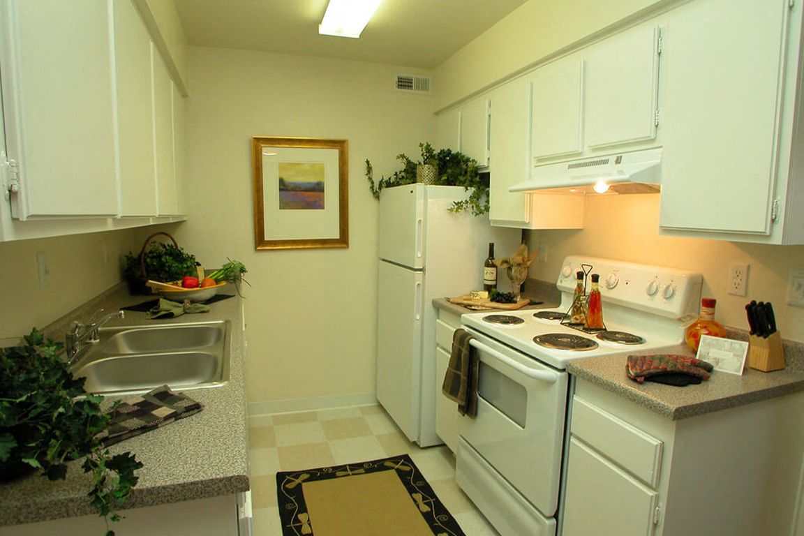 Kitchens include dishwasher and refrigerator