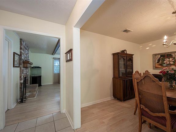 Foyer leads to dining room and living room.