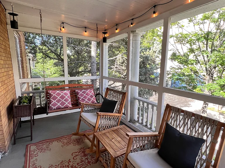 The very cozy front porch with views of the downtown Minneapolis skyline and Minneapolis Art Institute.