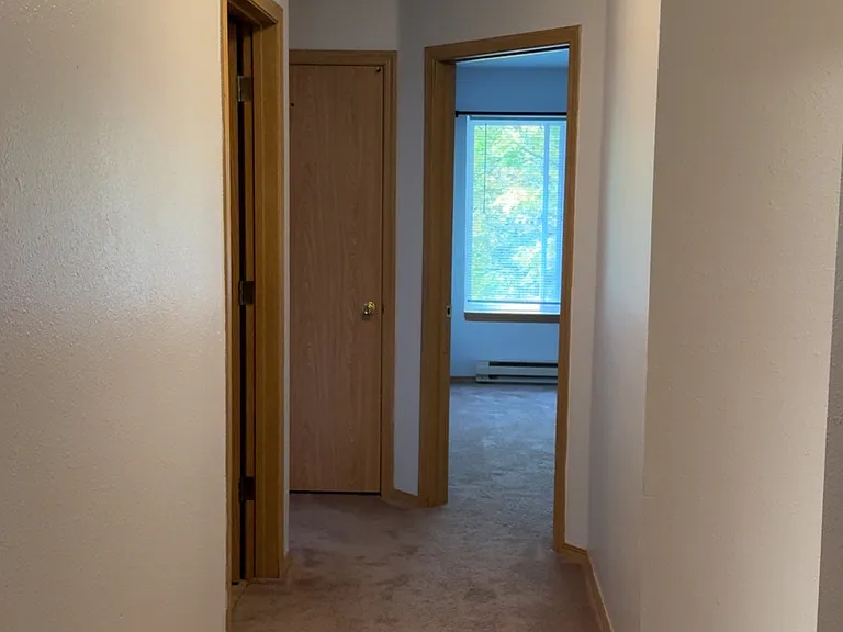 Hallway to bedrooms and bathroom