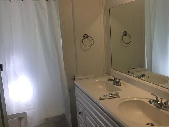 Bathroom w double sink and w/d