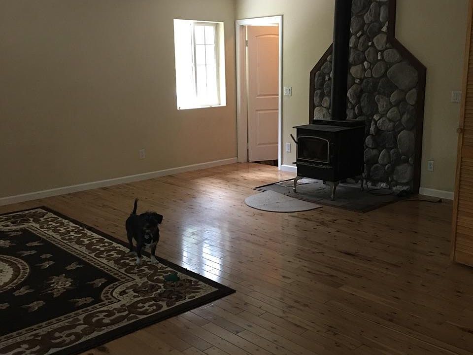 living room with wood stove