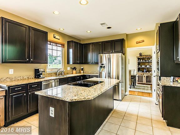 Spacious updated kitchen has granite counters