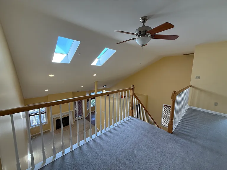 View of Living Room from stairway to Loft.