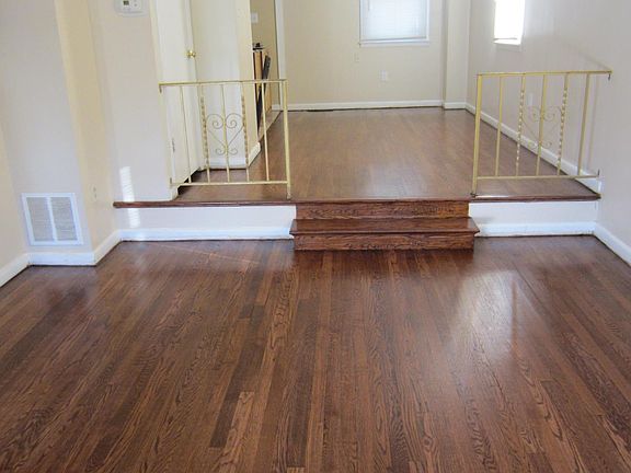 Living room & dining room- looking from front to back. Kitchen island is on the left side off the dining room.