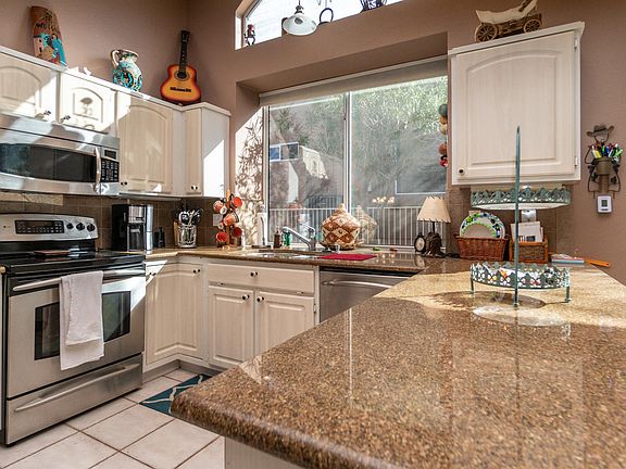 4th image of 8903 E Yucca Blossom Dr