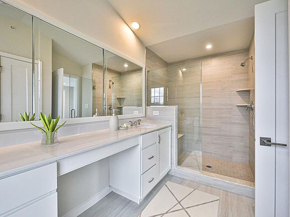 Serene Primary Bathroom with Glass Enclosed Shower