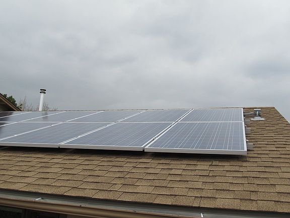 Photovoltaic Solar Panels on Roof on Roof
