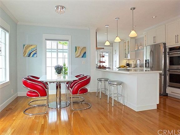 Open dining area adjacent to kitchen