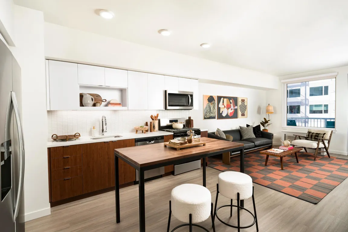 Chef-inspired kitchens featuring quartz countertops, designer cabinetry, and sleek under-cabinet lighting.