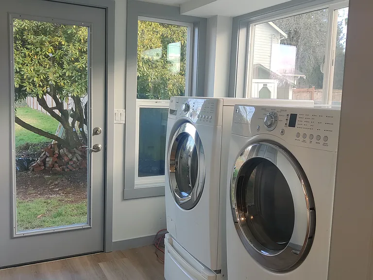 Laundry room with pantry