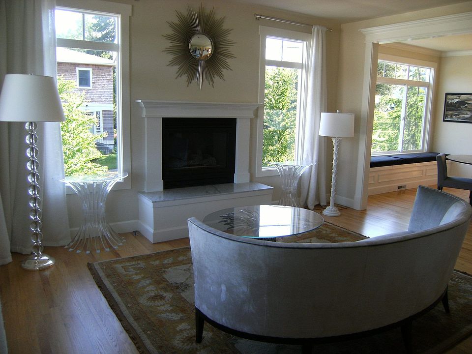 Living room has south facing windows for lots of light.
