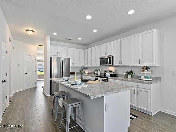 5th image of 15055 RAIN LILY Street
