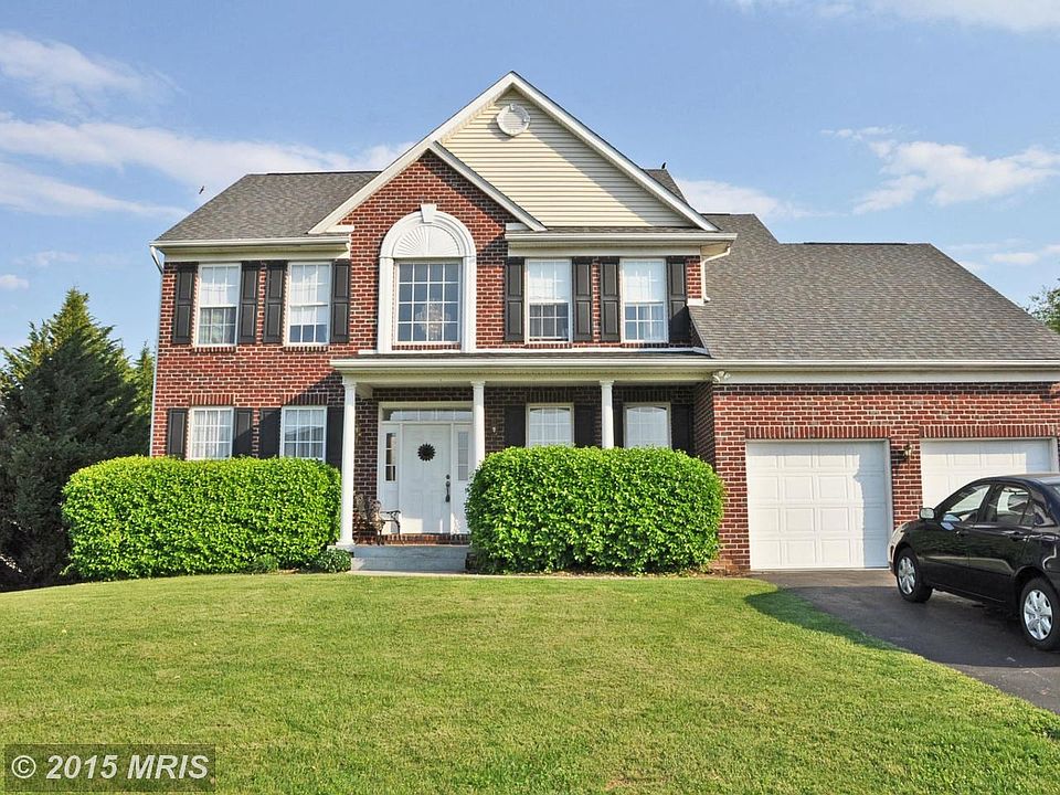 Full brick front w/ covered porch