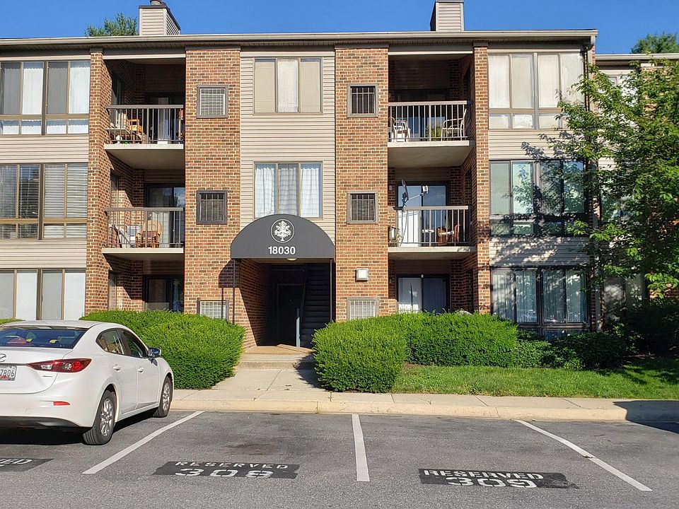 Building front with reserved parking
