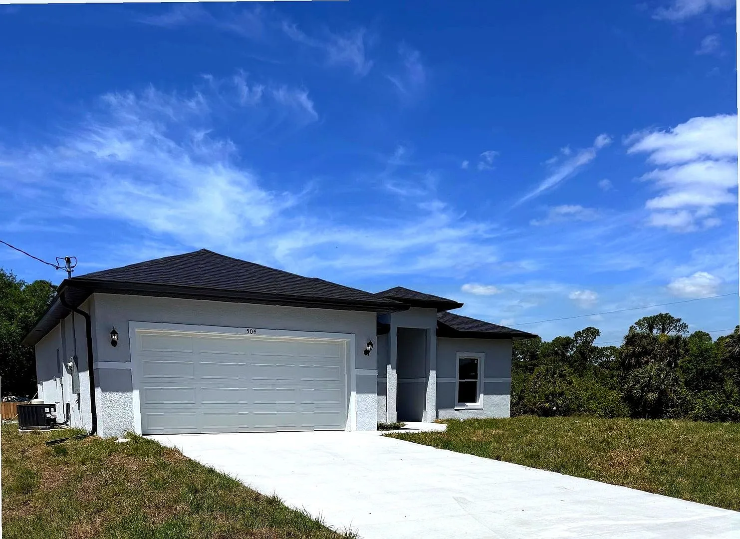 New 4 Bed / 2 Bath / 2 Car Garage Family Retreat in Desirable Lehigh Acres! — Photo 2
