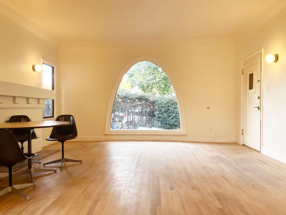 Real hardwood floors and classic Spanish / art deco accents