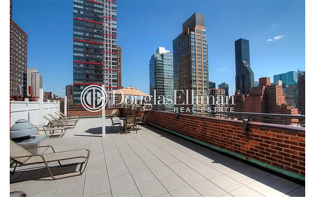 Sold by Douglas Elliman | media 13