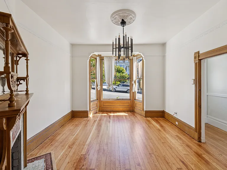 Family room / parlor room with historic details.
