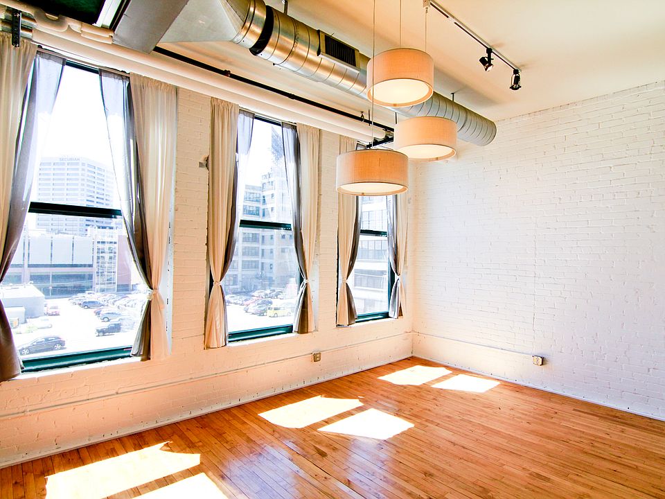 Large windows with downtown views