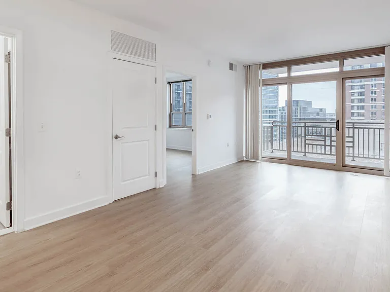 Living Room with Balcony and Hard Surface Flooring
