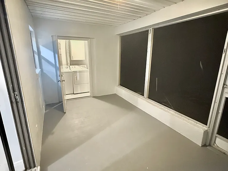 Screened-in patio from glass door view