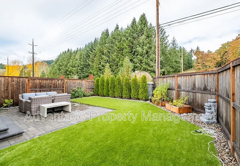 5587 NW Torchcrest Pl — Photo 17