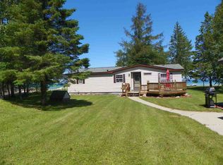 4021 Pointe Dr, Carp Lake, MI 49718