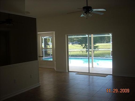 Kitchen and great room overlook the screened pool area.