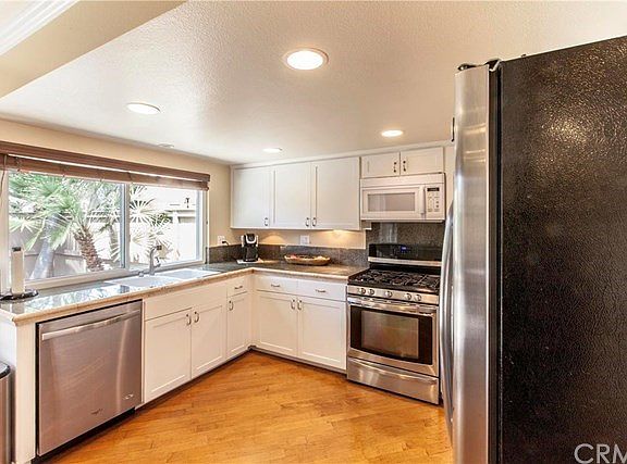 Large window with view to enclosed patio