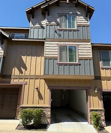 Convenient 2-car tandem garage with a deep bay, offering secure parking and extra space for all your outdoor gear and seasonal storage