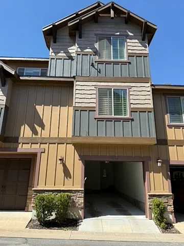 Convenient 2-car tandem garage with a deep bay, offering secure parking and extra space for all your outdoor gear and seasonal storage