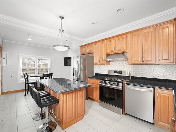 5th image of 5023 N Troy St