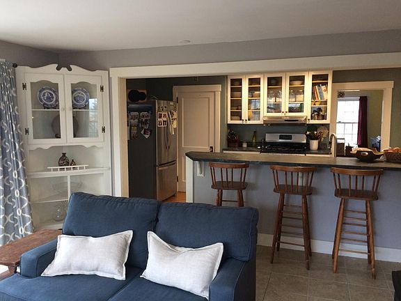 View of kitchen bar from family room area