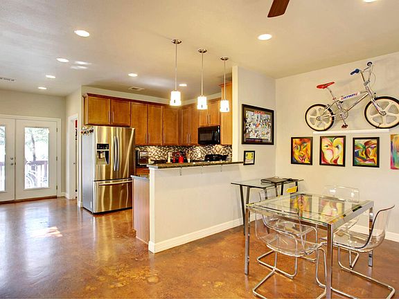 Spacious kitchen with tall cabinets.