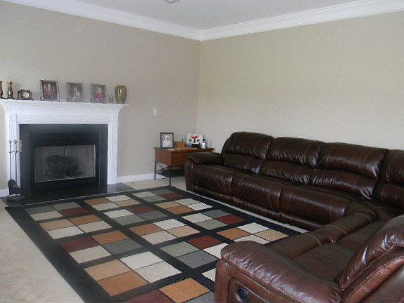 The Den has a nice fireplace and a great place for the family after a long day