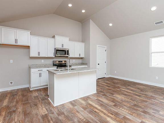 The Longleaf by Nason Homes- Kitchen Island in Woodland Farm