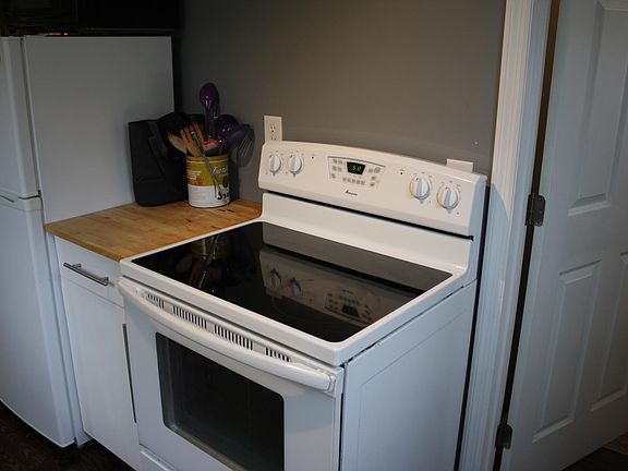 Stove/oven, refrigerator, and microwave included.