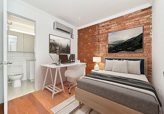 5th image of 333 E 9th St APT 2