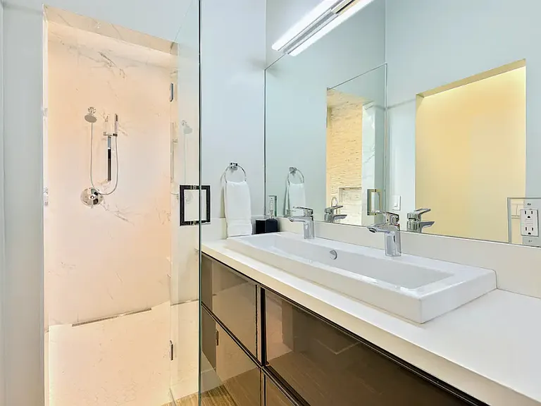 Primary Shower and Sink Area.
