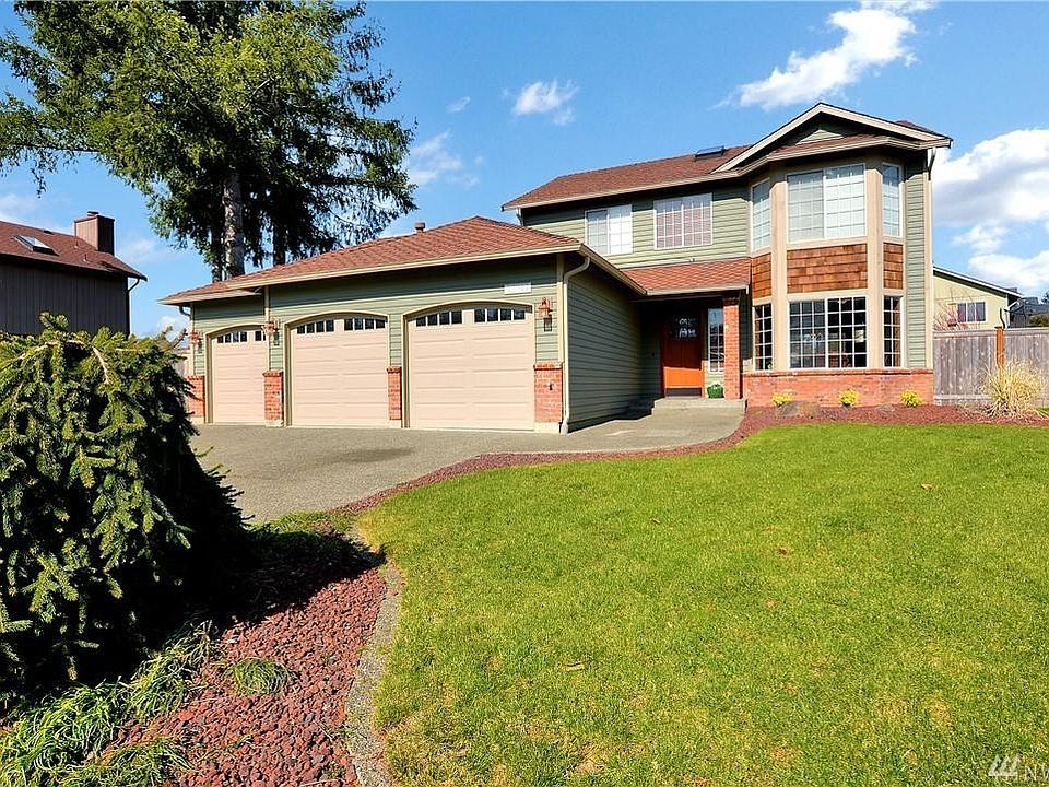 Two story charmer with three car garage in desirable Rosewood Parke community with private park for your enjoyment.