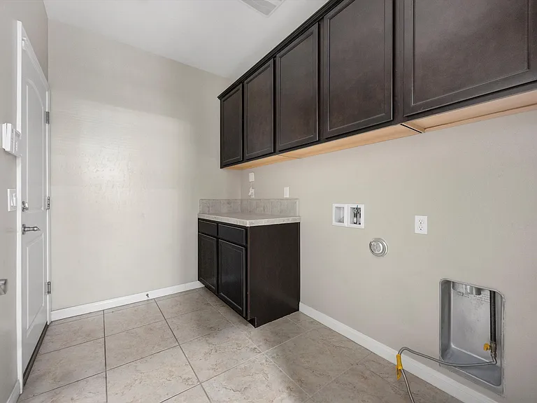 laundry room between garage and kitchen