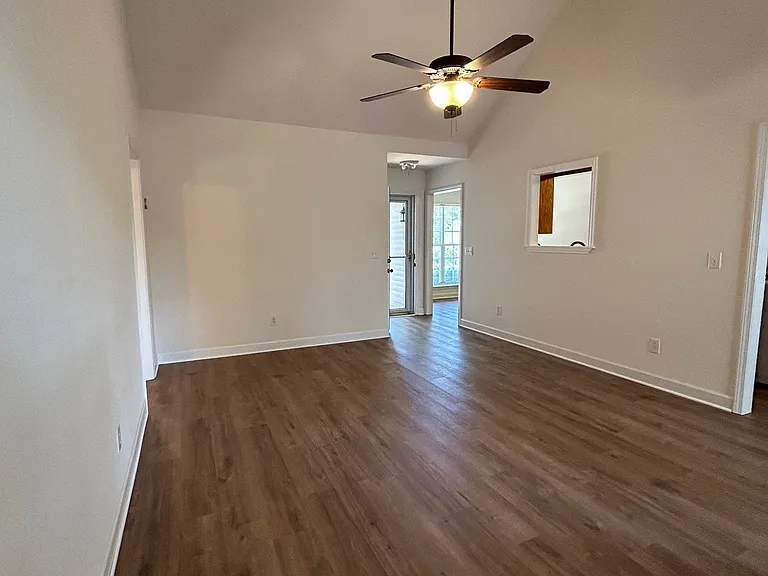 Wide-plank LVP flooring throughout most of home